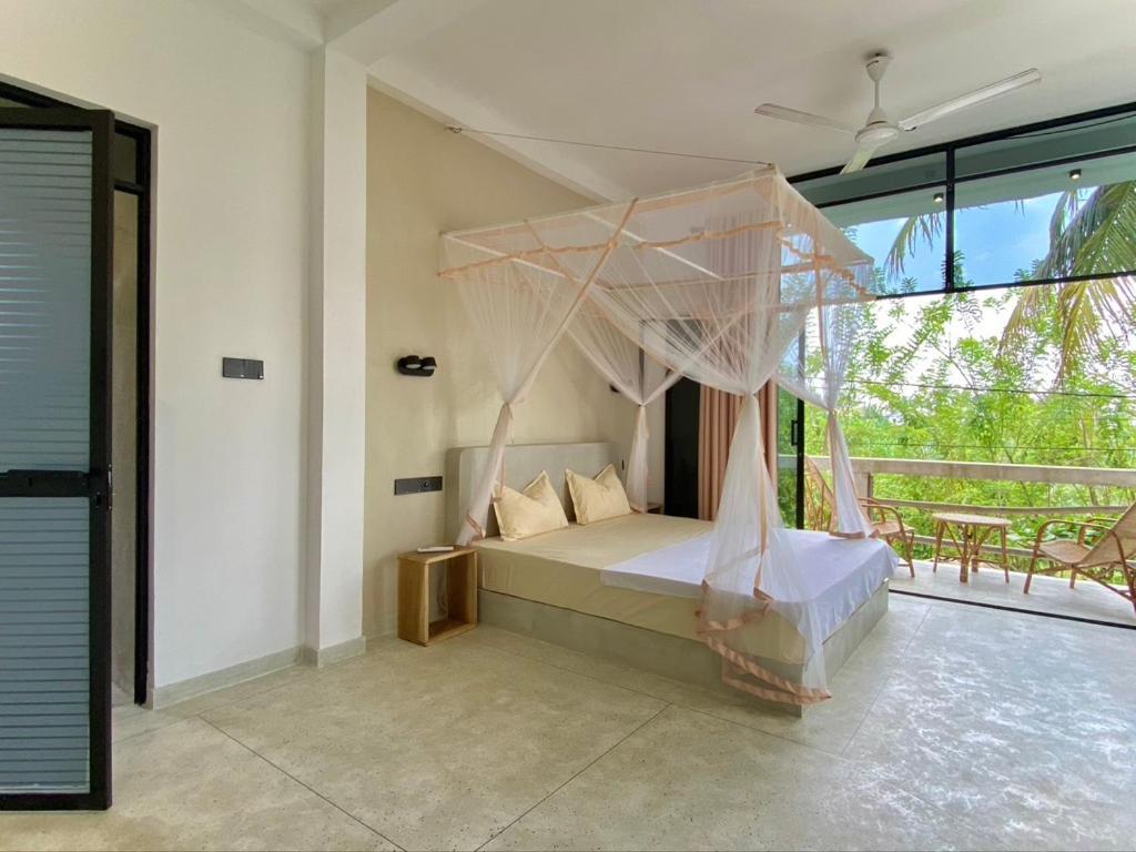 מלון מידיגמה איסט Lotus Surf House מראה חיצוני תמונה
